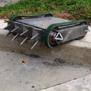 MARK II Combat Robot Project Developed by CRAE TECH Featured Picture. Robot on Concrete Obstacle.